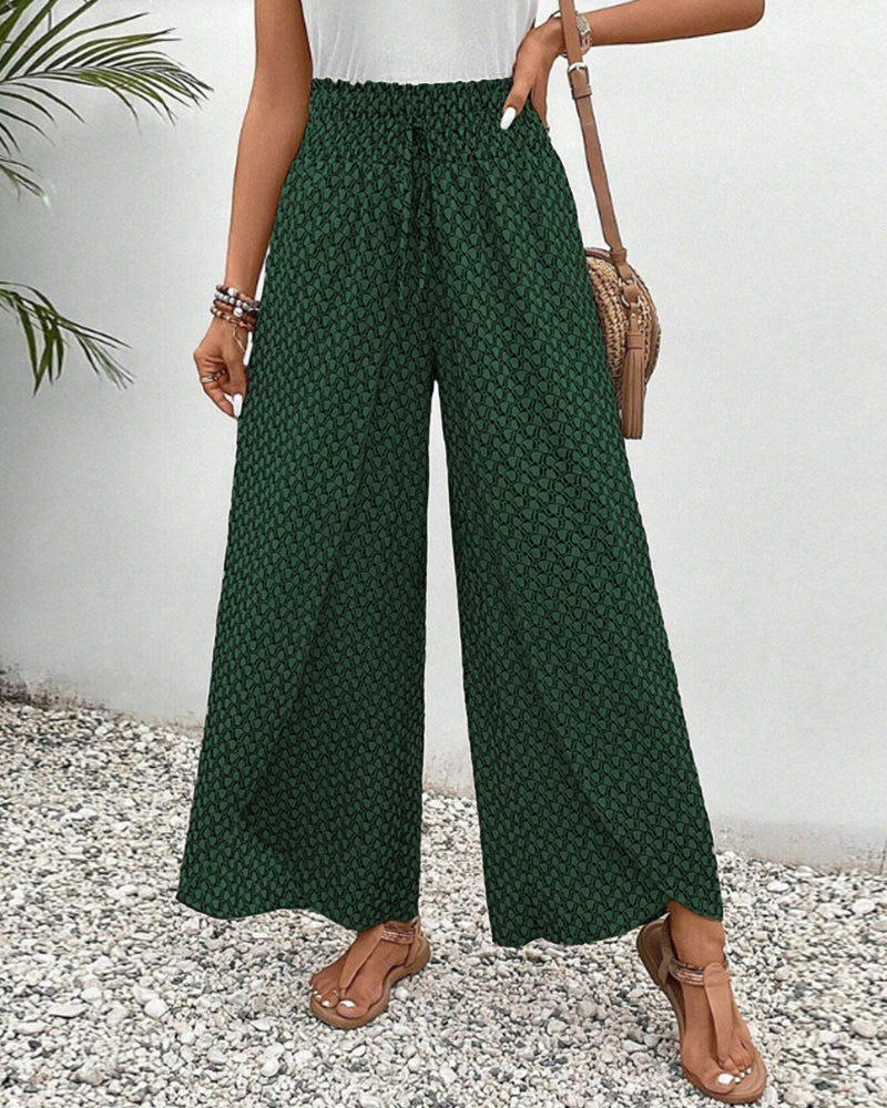 Damenhose mit weitem Bein und geometrischem Muster aus seitlicher Ansicht