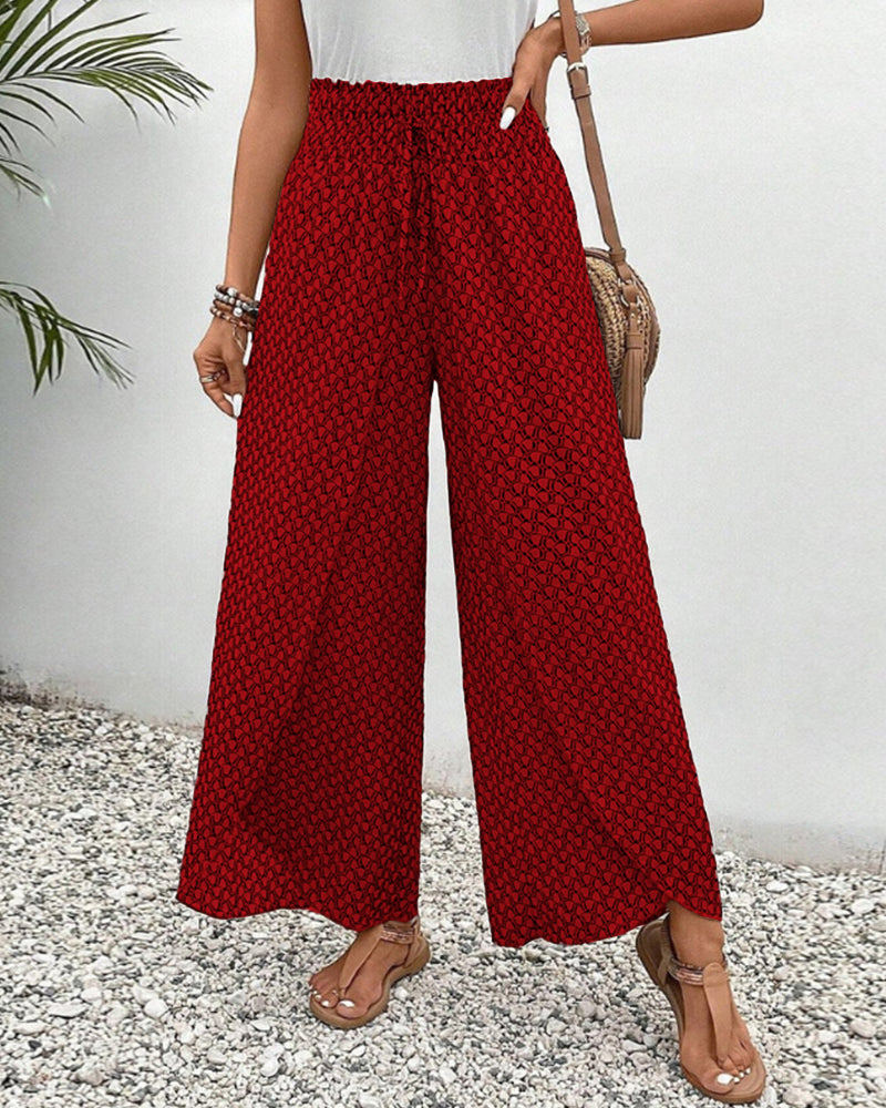 Weite Damenhose mit geometrischem Muster in Rückansicht