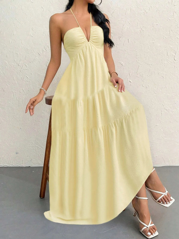 Maxikleid mit Neckholder und Stufen aus transparentem Polyester