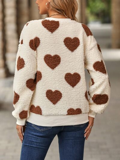 Gemütlicher Strickpullover mit Herzmuster für winterliche Eleganz
