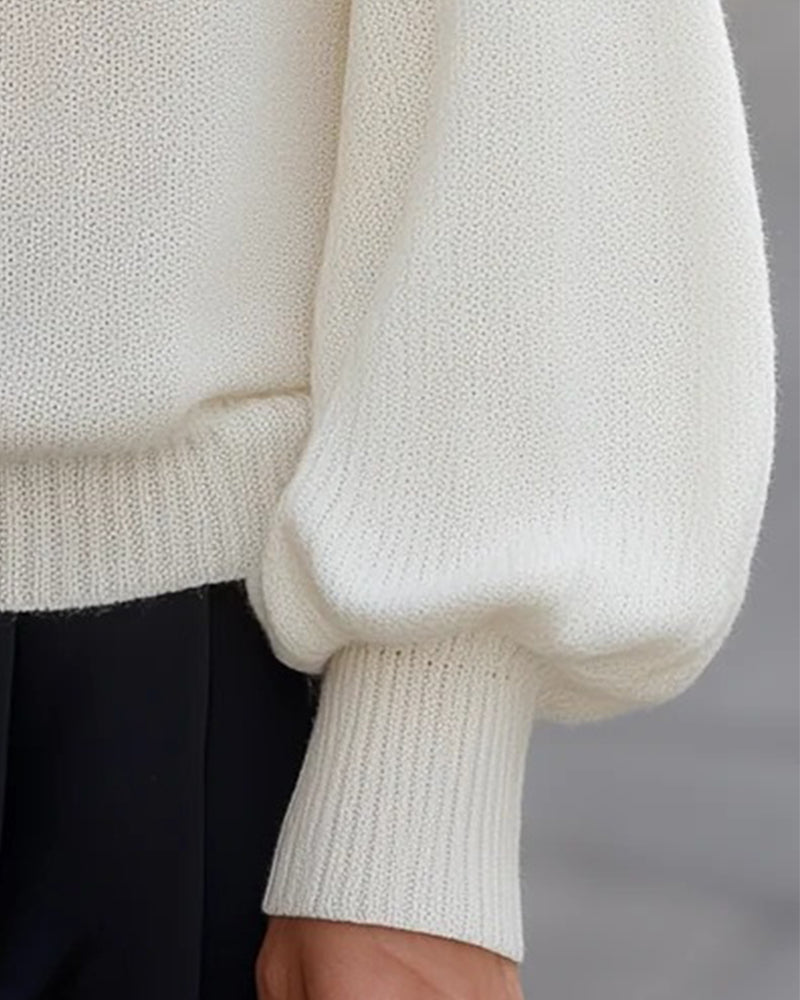 Damenpullover mit schulterfreiem Ausschnitt und Laternenärmeln im Detail