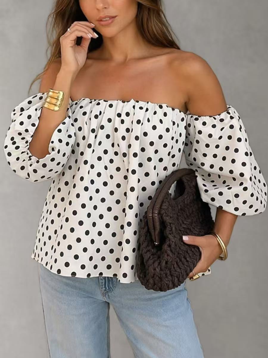 Damen Off-Shoulder-Bluse in Weiß mit Tupfenmuster vorne dargestellt