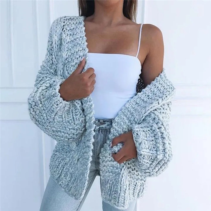 Cozy knitted cardigan in a solid color, casual