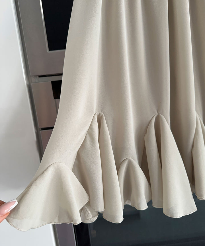 Schickes Beige Rocker-inspiriertes Kleid