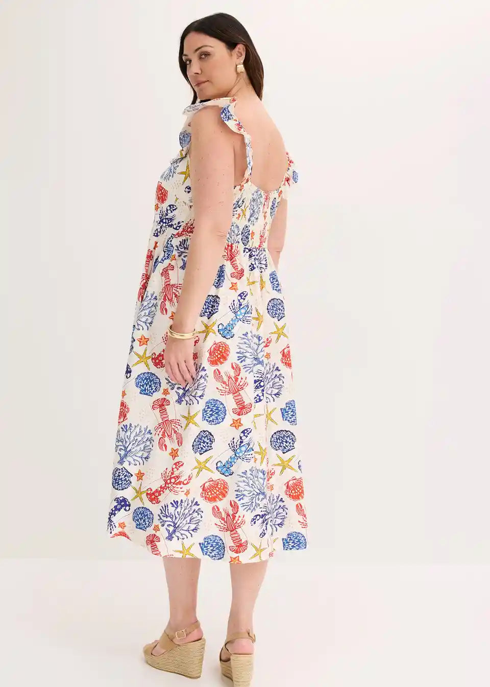Damenkleid mit Meerestiermuster und gerüschten Trägern aus Frontansicht
