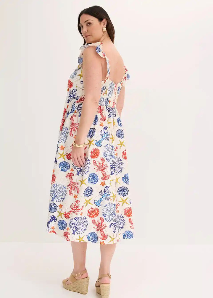Damenkleid mit Meerestiermuster und gerüschten Trägern aus Frontansicht