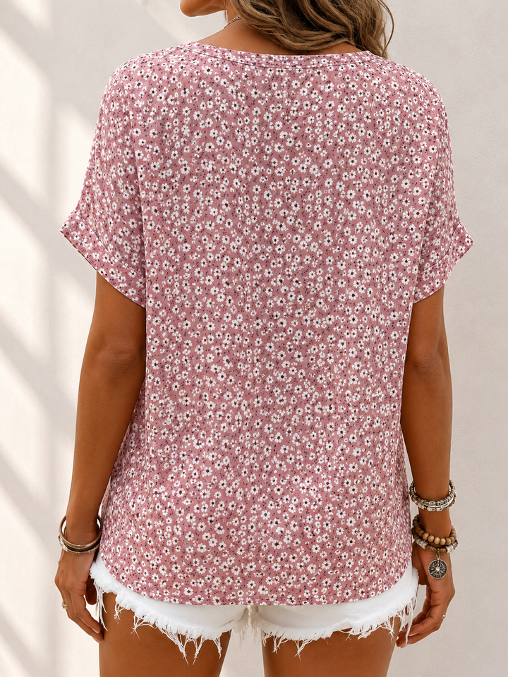 Damenbluse mit Blumenprint in fließender Passform im kompletten Look