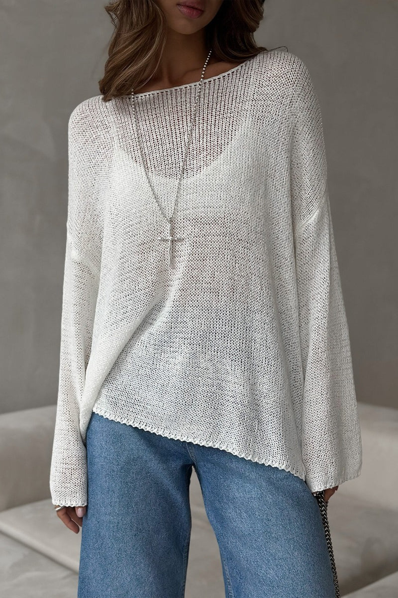 Detailansicht des luftigen Lochstrickmusters am Damenpullover