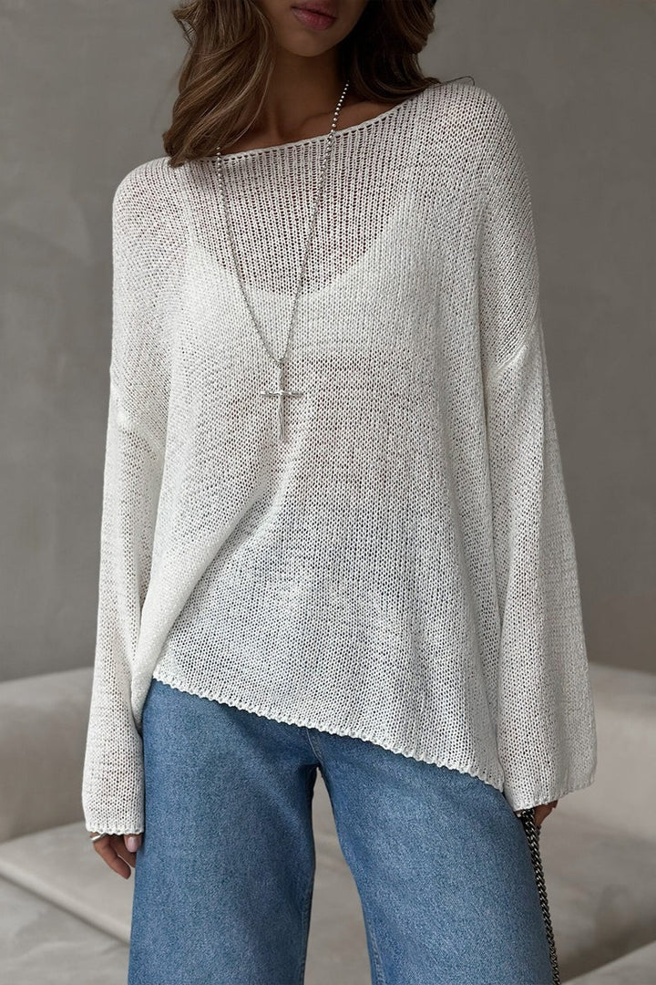 Detailansicht des luftigen Lochstrickmusters am Damenpullover