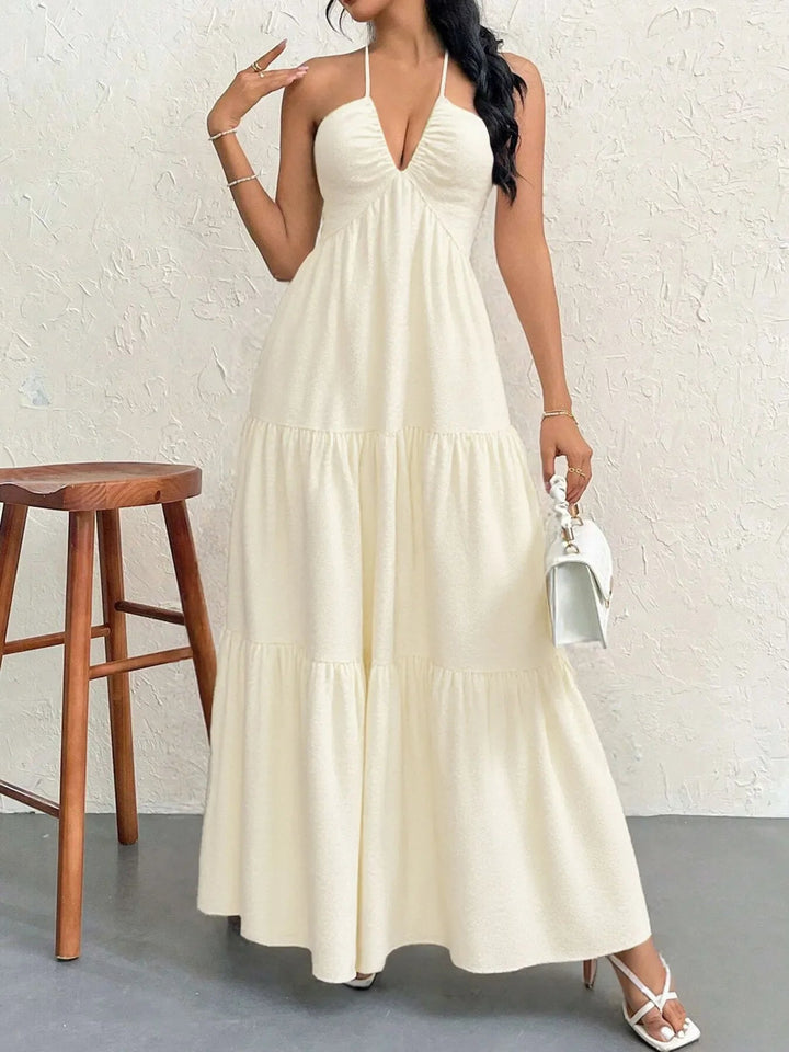 Maxikleid mit Neckholder und Stufen aus transparentem Polyester