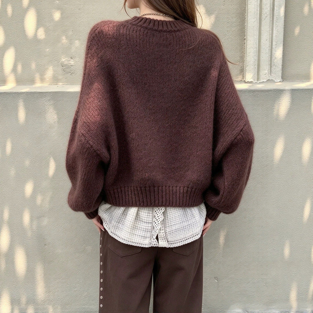 Damenpullover mit voluminösen Ballonärmeln in Detailansicht