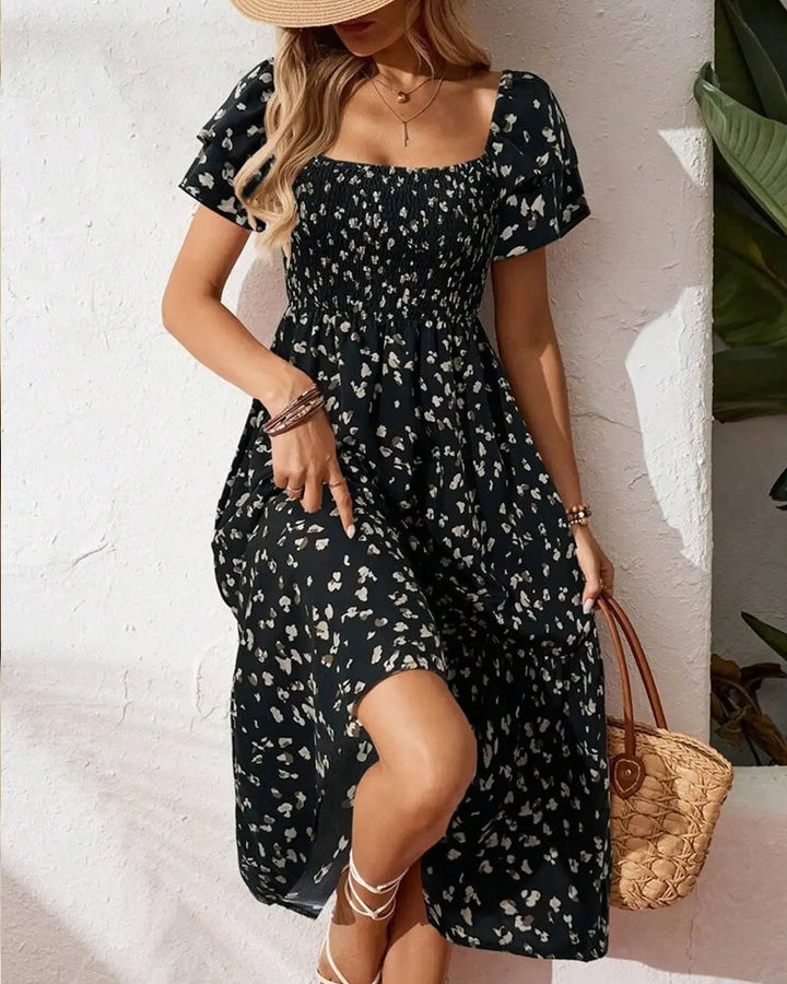 Damen Midikleid mit Print in A-Linie in Rückansicht
