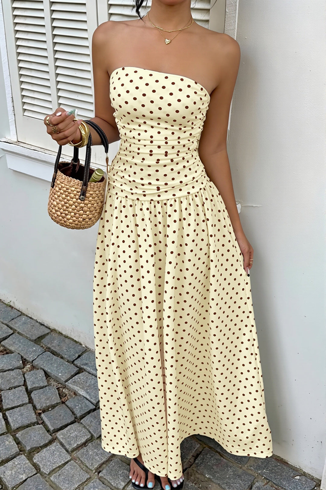 Trägerloses Damen Maxikleid mit Punktmuster in Rückansicht