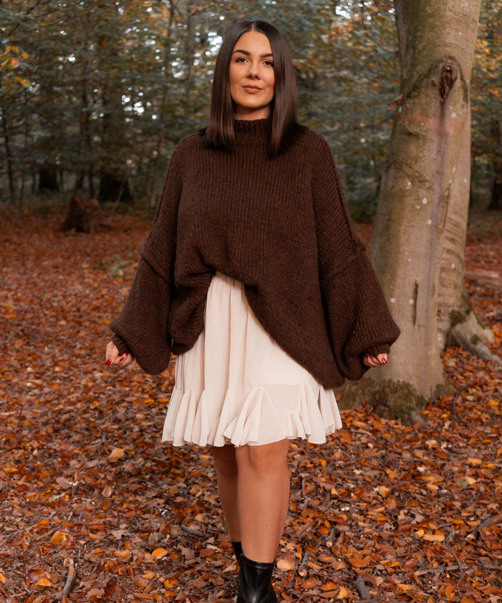 Schickes Beige Rocker-inspiriertes Kleid