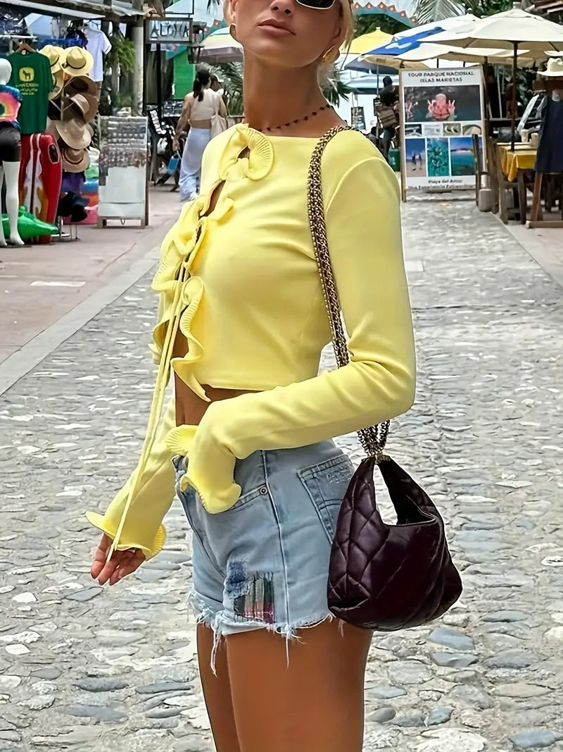 Gemütlicher Strickcardigan mit Rüschen und Bindeband vorne