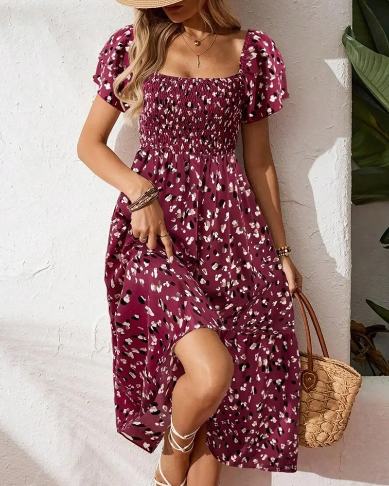 Damen Midikleid mit Print in A-Linie in ganzer Länge getragen