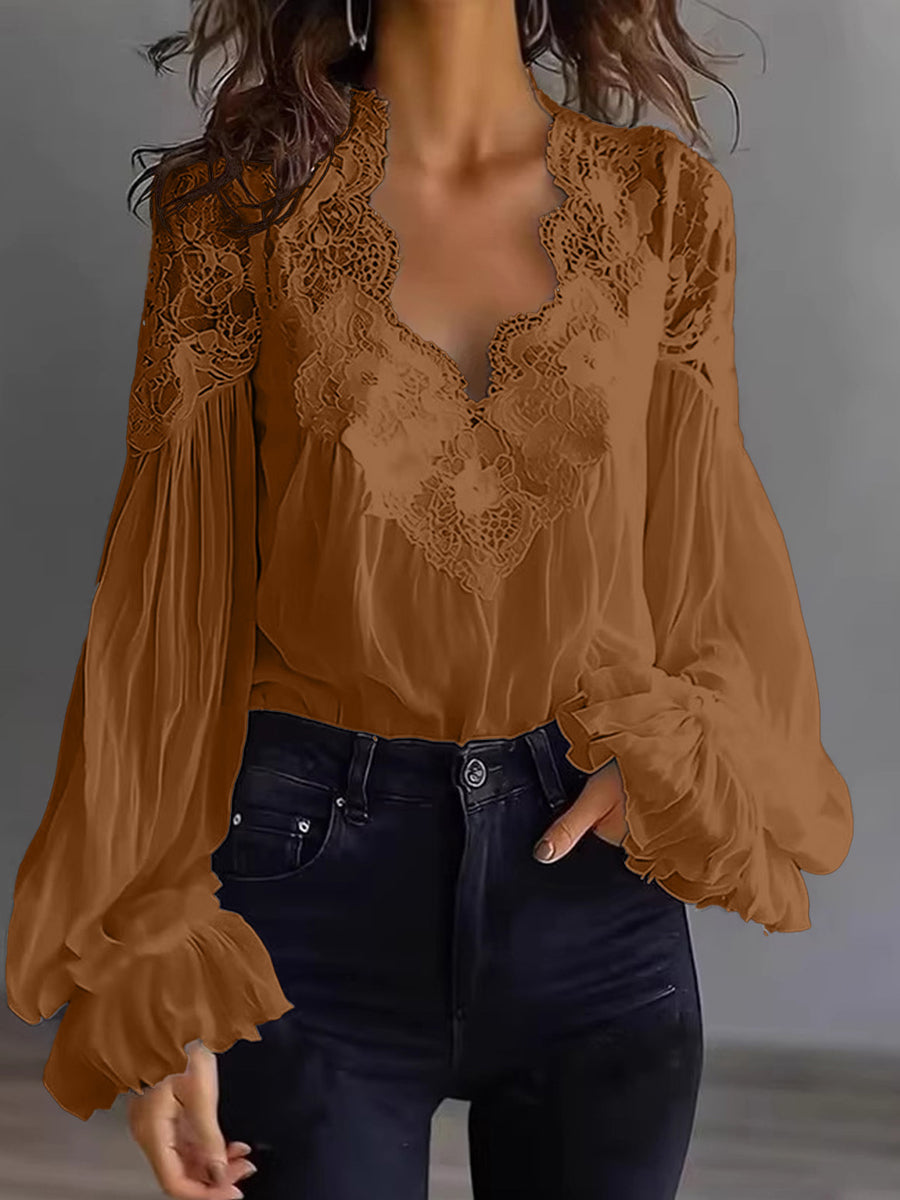Damenbluse mit Spitzenpatchwork und Puffärmeln