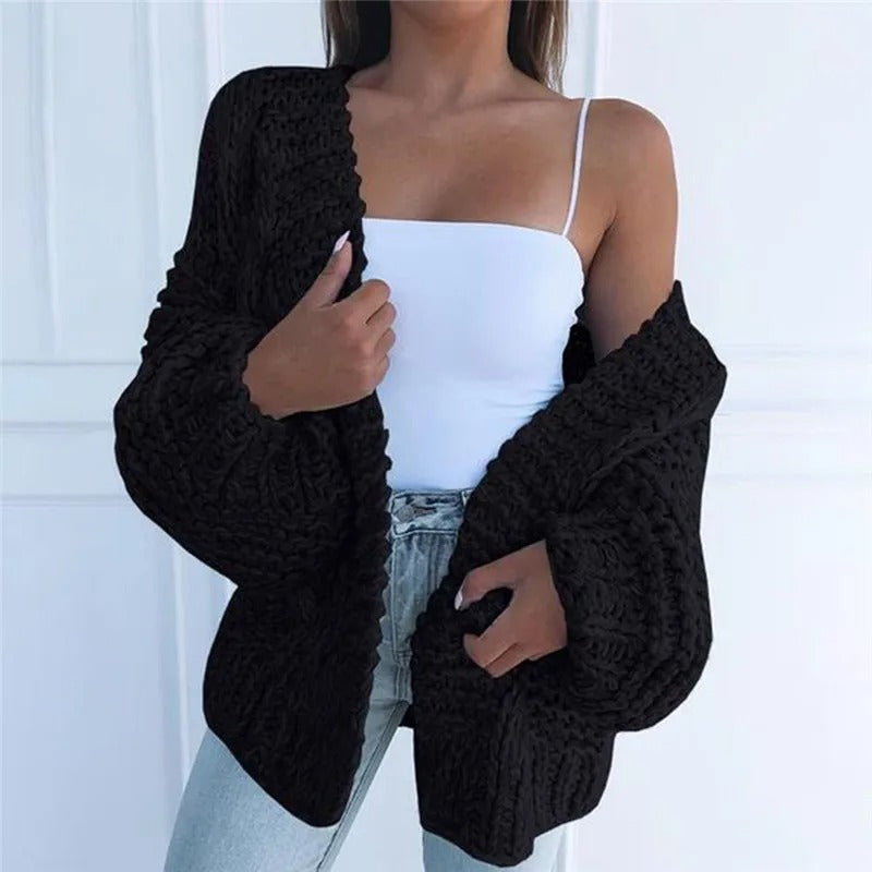 Cozy knitted cardigan in a solid color, casual