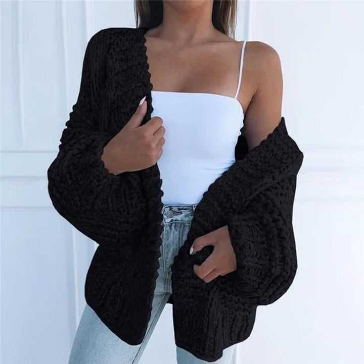 Cozy knitted cardigan in a solid color, casual