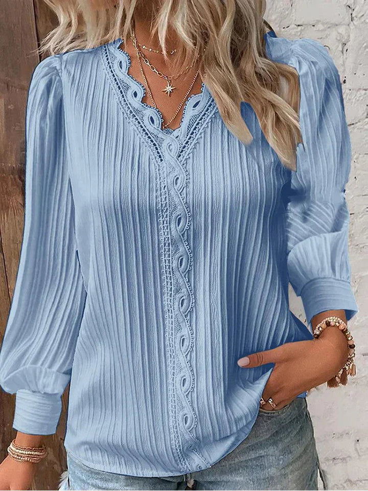 Damenbluse aus Chiffon mit Spitzenbesatz