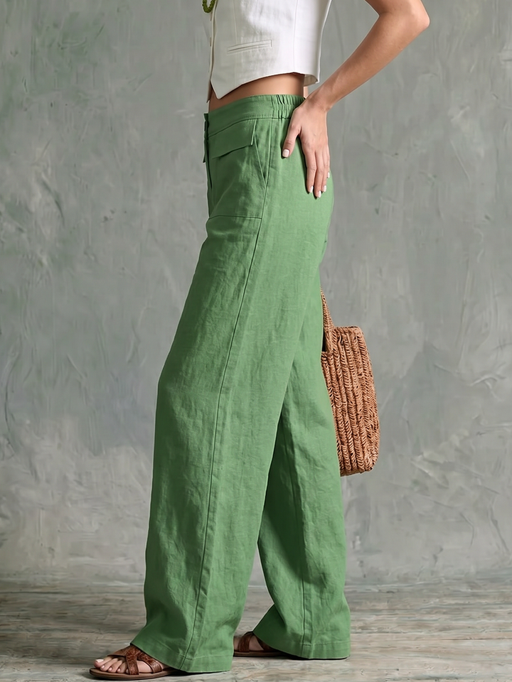 Grüne weite Damenhose mit hoher Taille und seitlichen Taschen