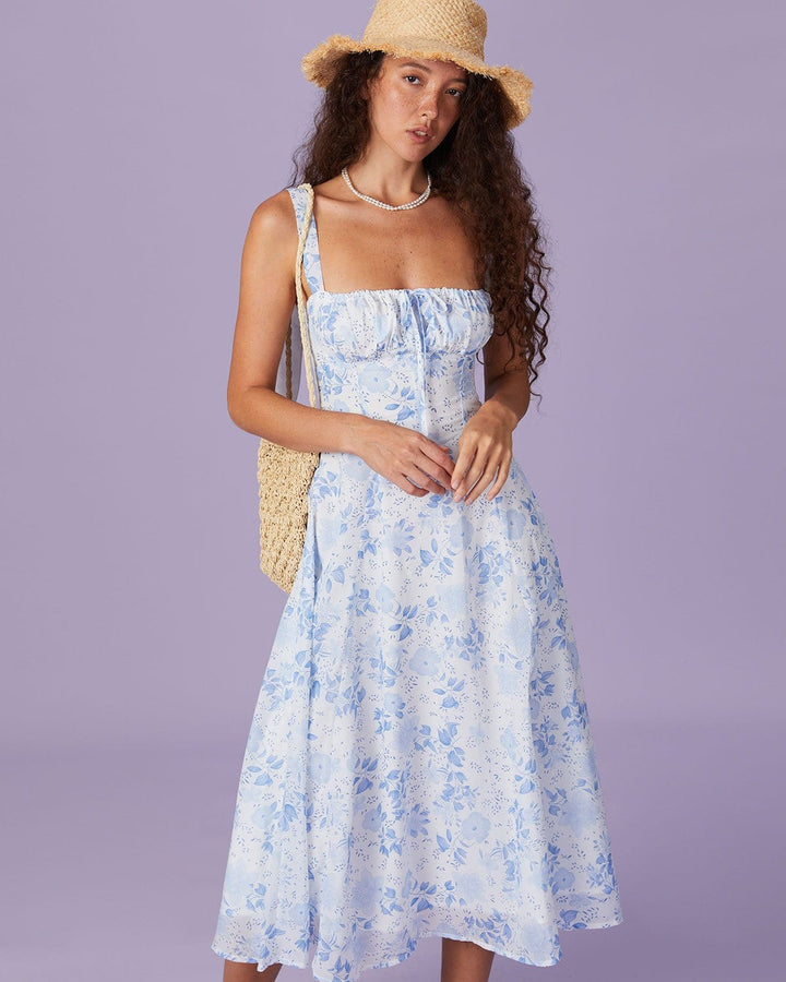 Blaues Midikleid mit Blumenmuster, eckigem Ausschnitt und gerafftem Design