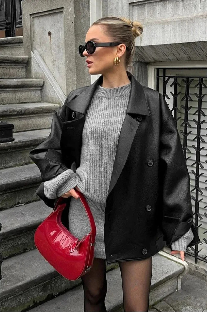 Double-breasted black leather coat with lapel collar 