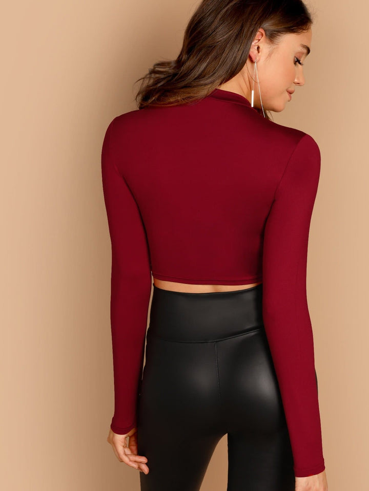 Stehkragen Enganliegendes Langarm-Cropped-Top