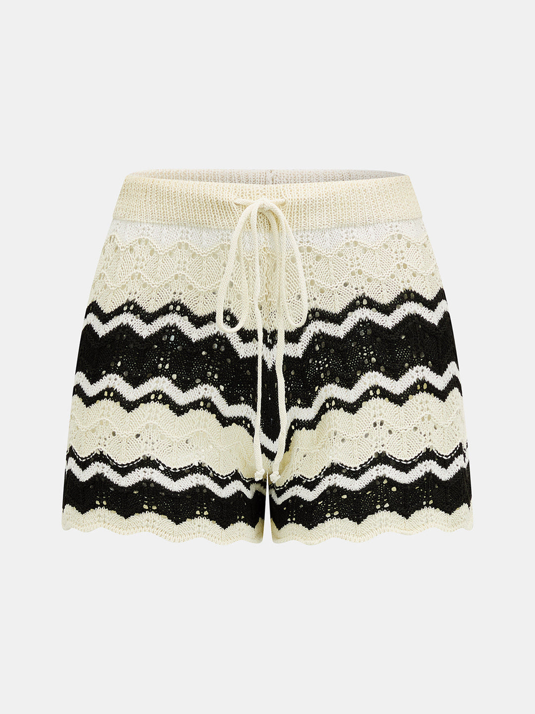 Seitliche Ansicht des Damen-Stricksets mit Cardigan und Shorts