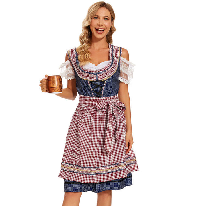 Traditionelles Damen-Dirndl mit karierter Schürze und dekorativer Schnürung