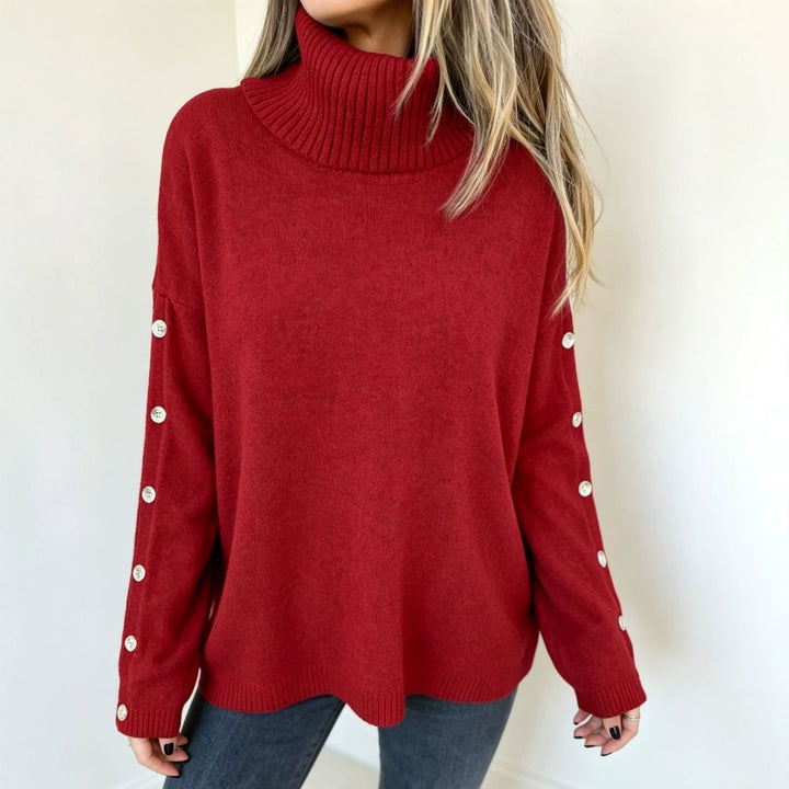 Detailansicht der Knöpfe am seitlichen Rollkragenpullover