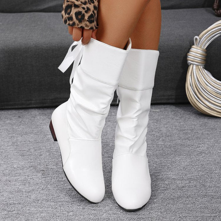 Damenstiefel mit rückseitiger Schnürung am gerafften Schaft