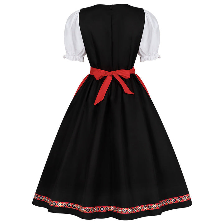 Damen-Dirndl mit dekorativen Puffärmeln und Schürze