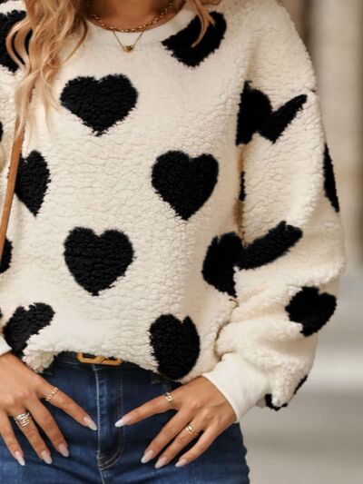Gemütlicher Strickpullover mit Herzmuster für winterliche Eleganz