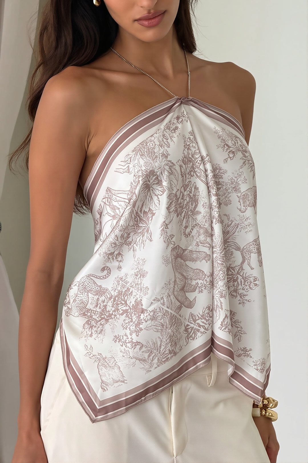 Damen-Top mit Neckholder und floralem Muster in Rückansicht