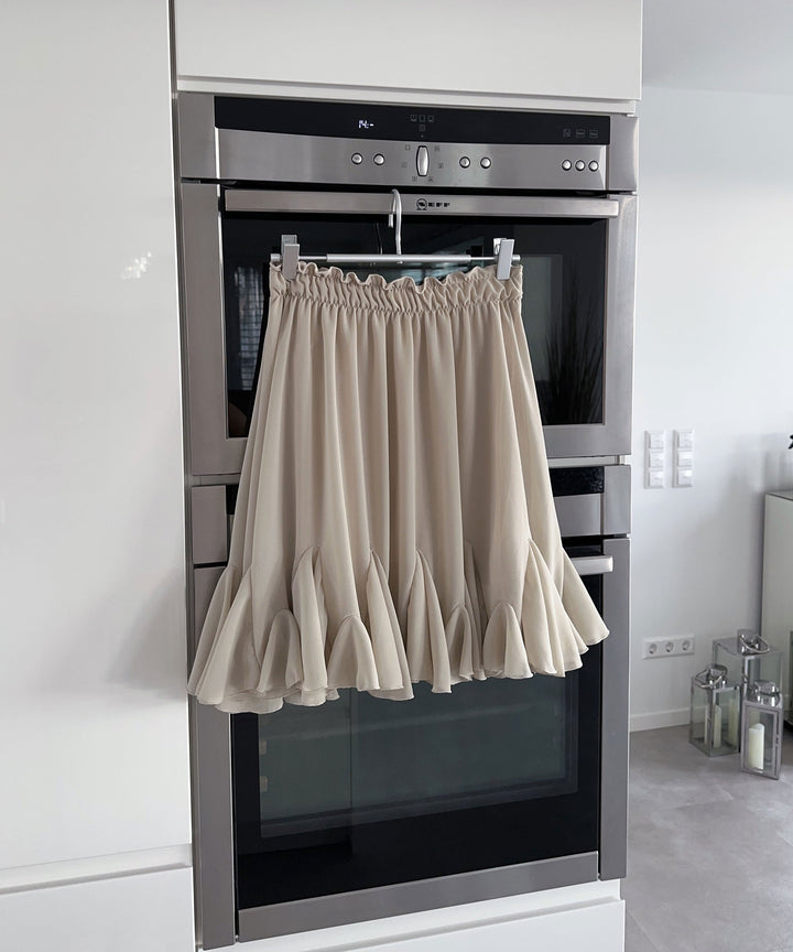 Schickes Beige Rocker-inspiriertes Kleid