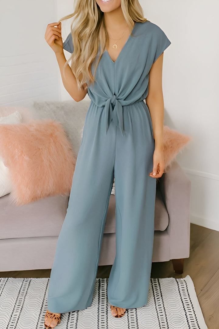 Damen ärmelloser Jumpsuit mit tiefem V-Ausschnitt, weiten Beinen und Taschen