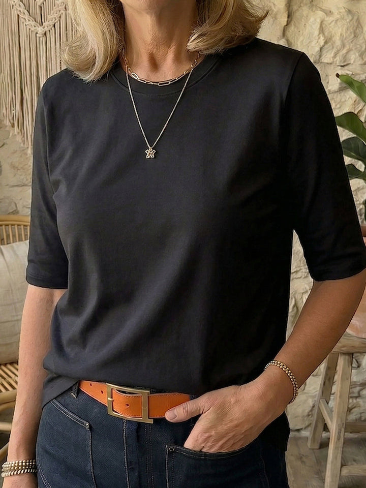 Gemütliches minimalistisches Baumwoll-T-Shirt mit halben Ärmeln