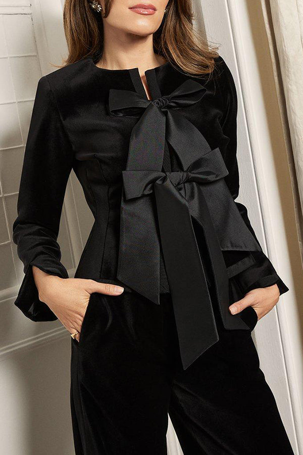 Taillierte Peplum-Jacke aus Taft mit Samtschleifendetail