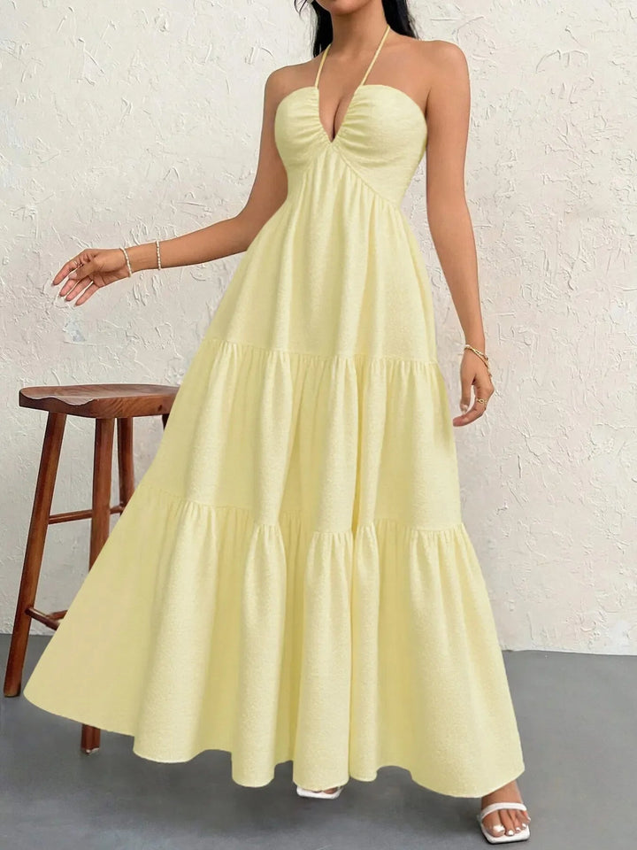 Maxikleid mit Neckholder und Stufen aus transparentem Polyester