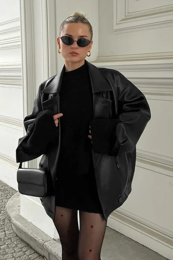 Double-breasted black leather coat with lapel collar 