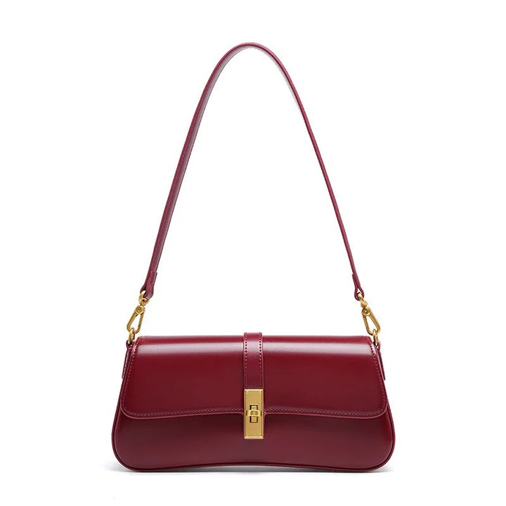 Helviora® | Glänzende Schultertasche mit goldener Schließe