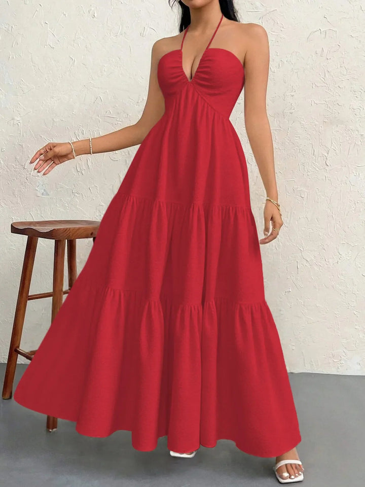 Maxikleid mit Neckholder und Stufen aus transparentem Polyester