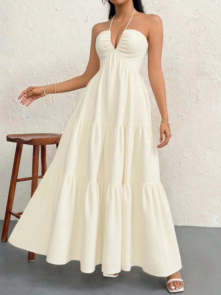 Maxikleid mit Neckholder und Stufen aus transparentem Polyester