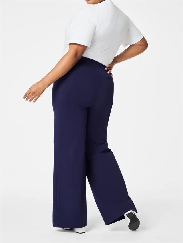 High-waisted, wide-cut trousers with hidden tummy comfort 