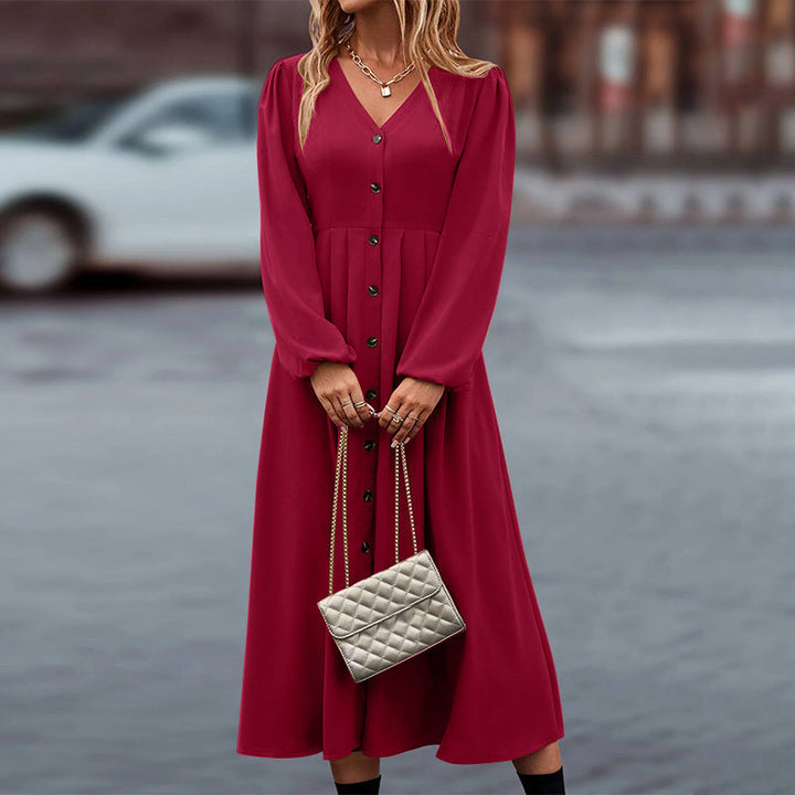Elegantes Damenkleid mit langen Ärmeln und durchgehender Knopfleiste