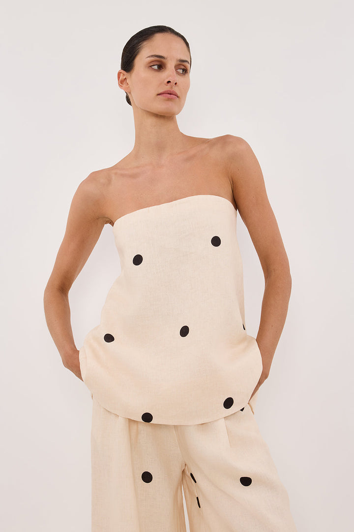 Detailansicht des Bandeau-Tops mit Punktmuster und Rückenreißverschluss