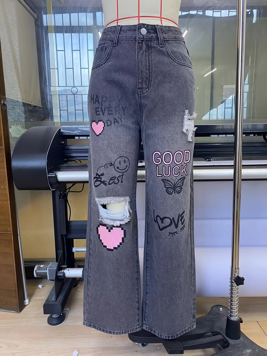 Kräftige Grafik High-Waist Weite Denim-Jeans