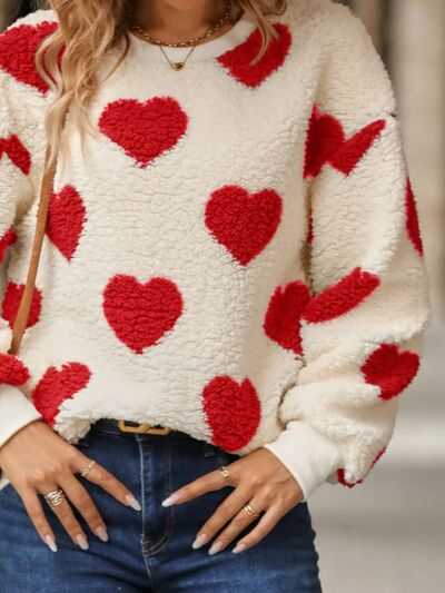 Gemütlicher Strickpullover mit Herzmuster für winterliche Eleganz