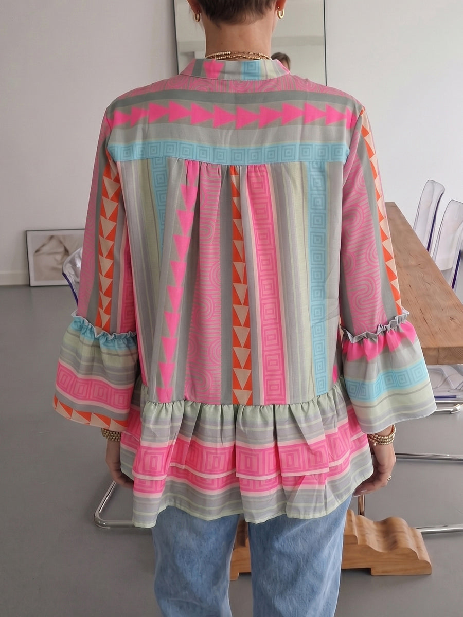 Damenbluse mit V-Ausschnitt und Volantsaum in Rosa-Grau, elegante Langarm-Ansicht